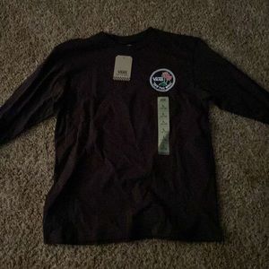 Vans long sleeve t-shirt. New with tags. Size L 14-16
